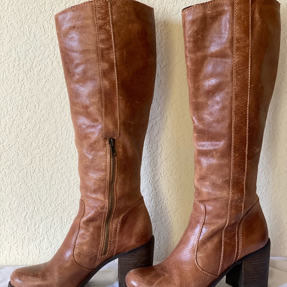 Steven by Steve Madden saddle tan boots.